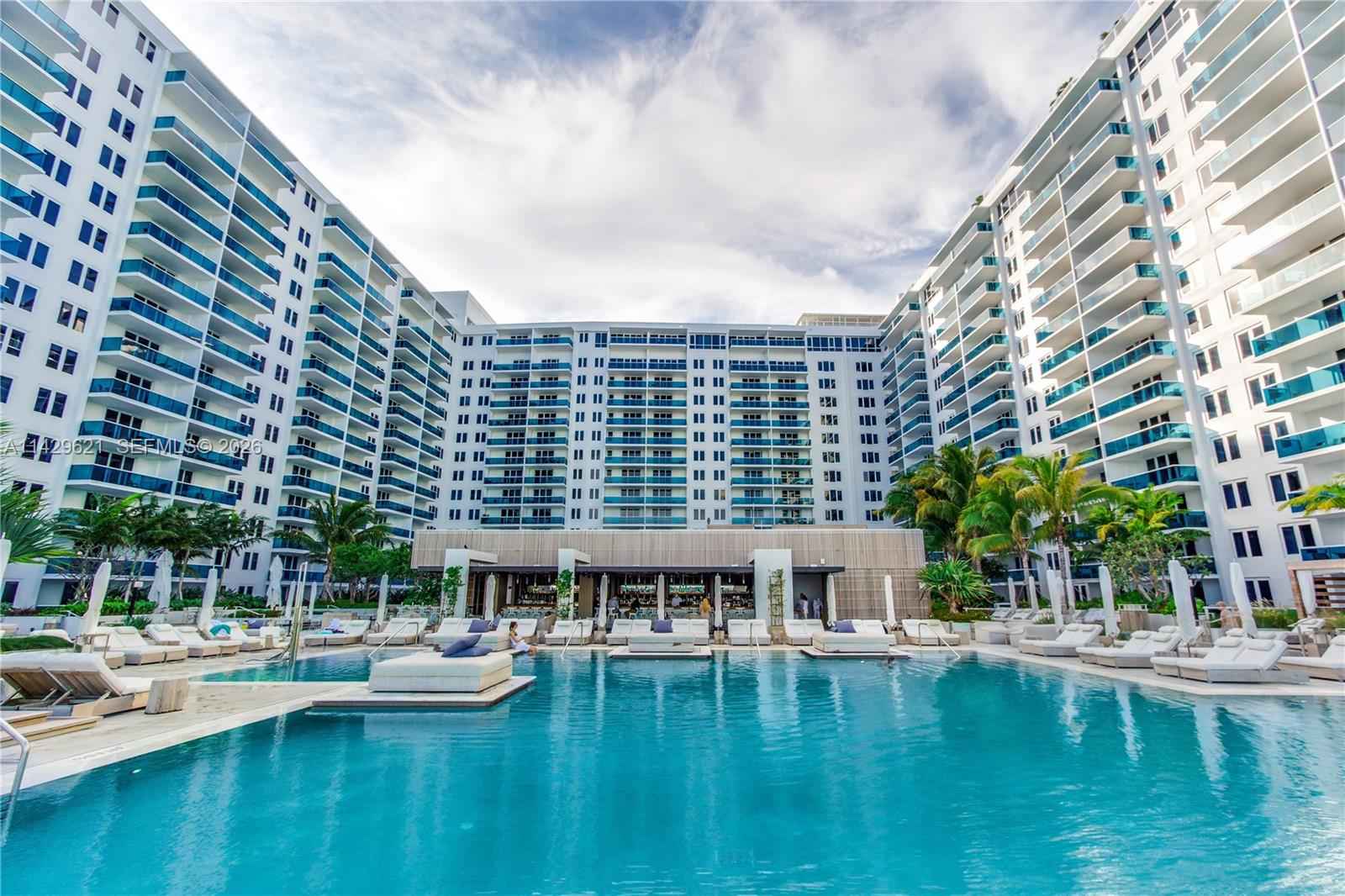 Beachfront Luxury With Rooftop Bar & Pool Access photo 2