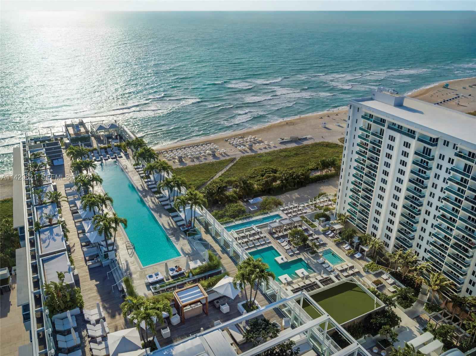 Beachfront Luxury With Rooftop Bar & Pool Access photo 3