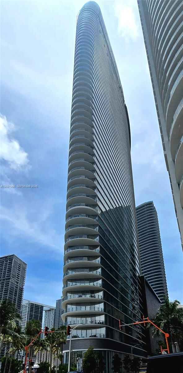 Aston Martin Residences: Luxury 1BR, Never Lived In