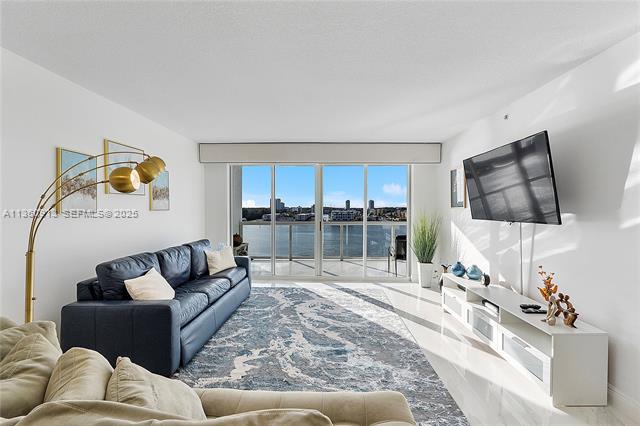 Renovated Waterfront 2BR, Steps to Beach