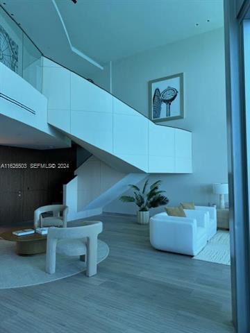 Jade Beach Penthouse: 180° Ocean Views, 22' Ceilings photo 3
