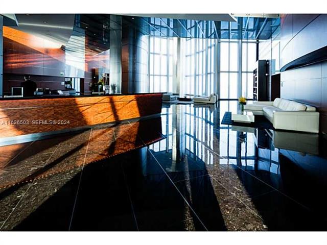 Jade Beach Penthouse: 180° Ocean Views, 22' Ceilings photo 2